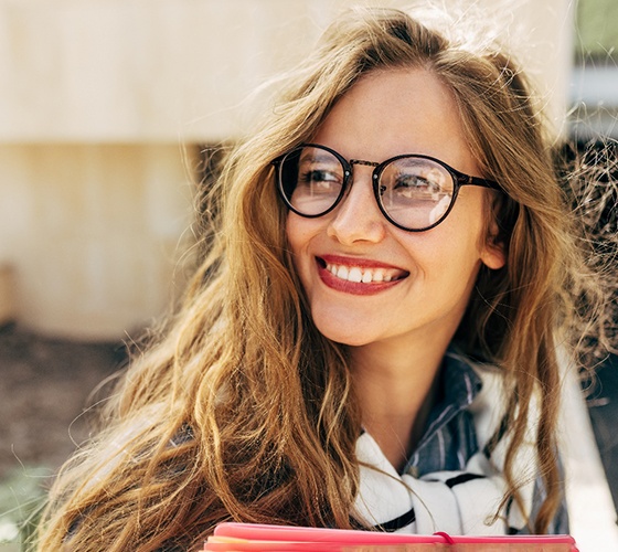 Woman smiling outside