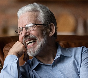 Man laughing with dentures