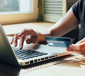 Woman using credit card