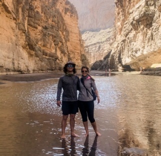 Doctor Burton and friend hiking in mountains