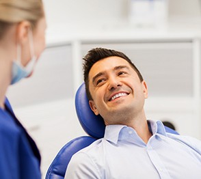 Man smiling at dentist