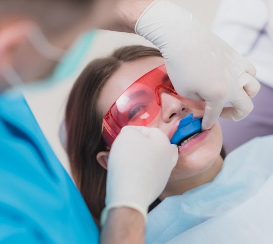 Patient receiving fluoride treatment